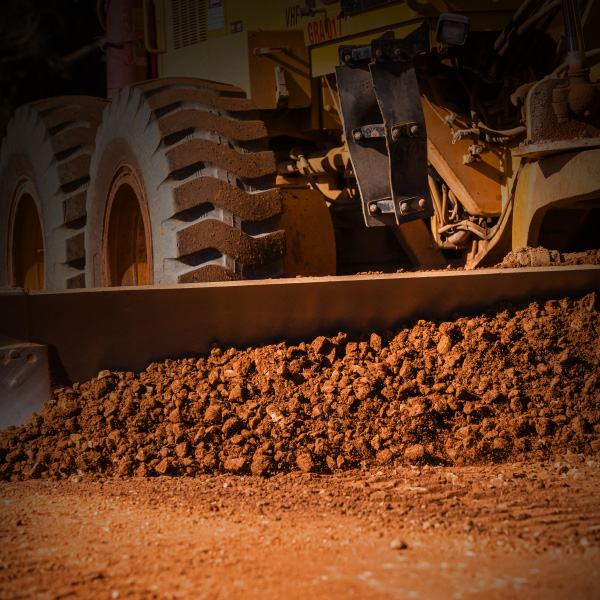 motor grader on construction site Melbourne